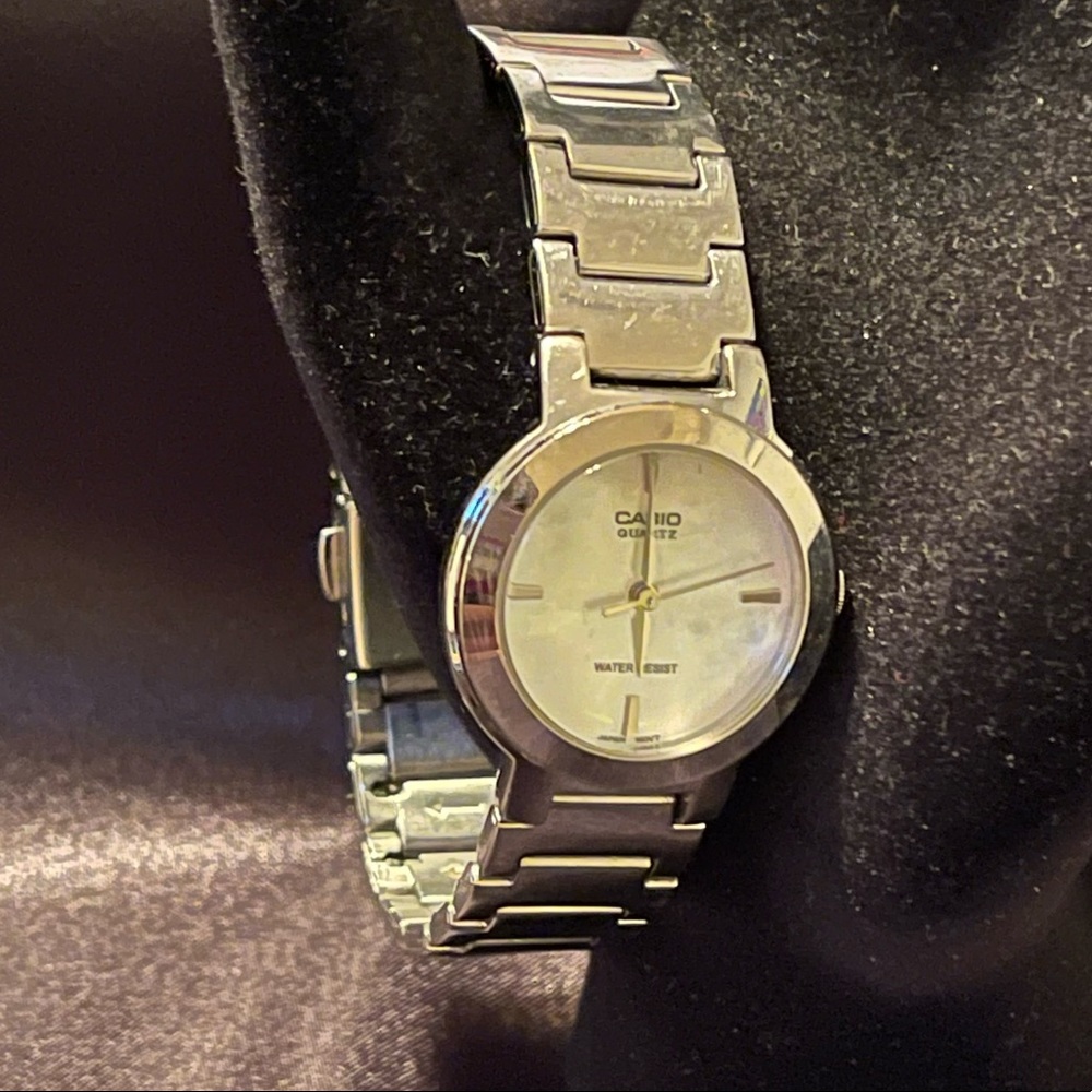Casio ladies silver tone single closure link bracket petite watch white dial